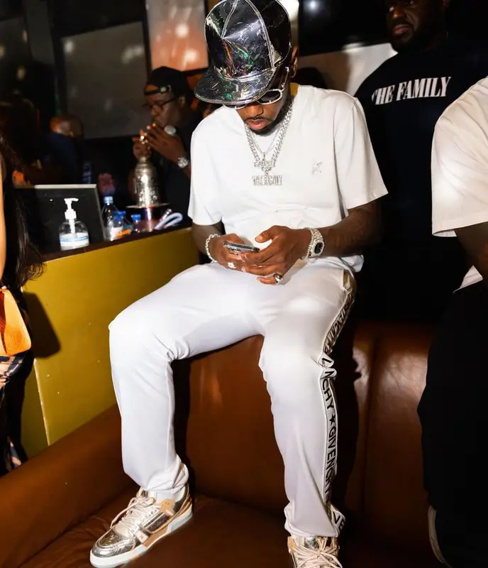 Fabolous outfit in Golden Goose, Cartier, and Louis Vuitton, 2021