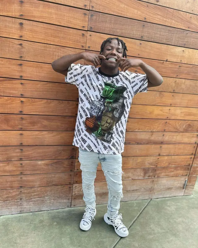 Jackboy outfit in Louis Vuitton, Amiri, and Fender, 2021