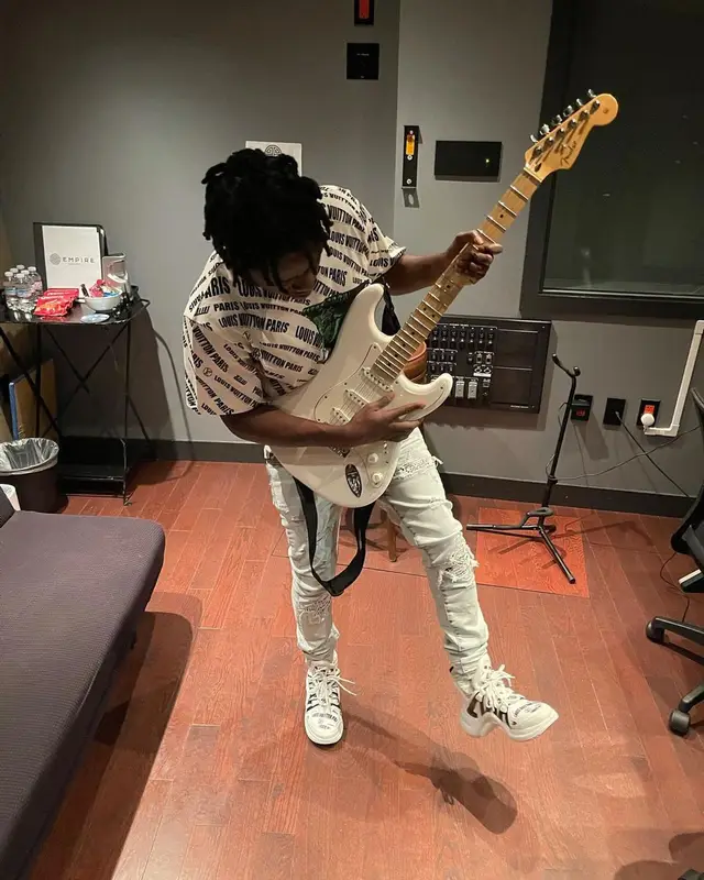 Jackboy outfit in Louis Vuitton, Amiri, and Fender, 2021
