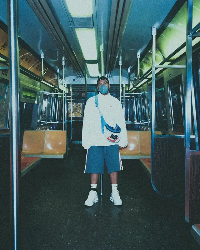 Feid outfit in Supreme, Gucci, and Nike, 2021