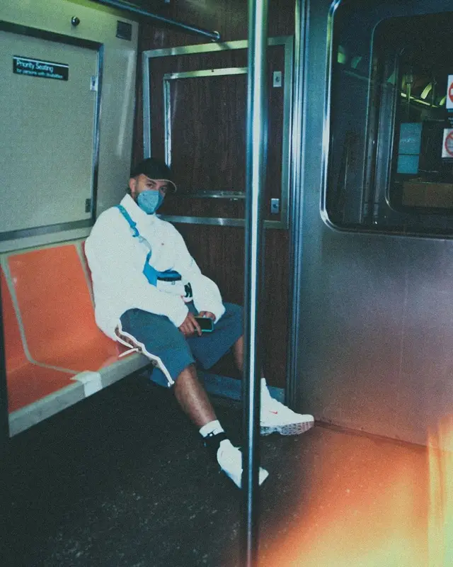 Feid outfit in Supreme, Gucci, and Nike, 2021
