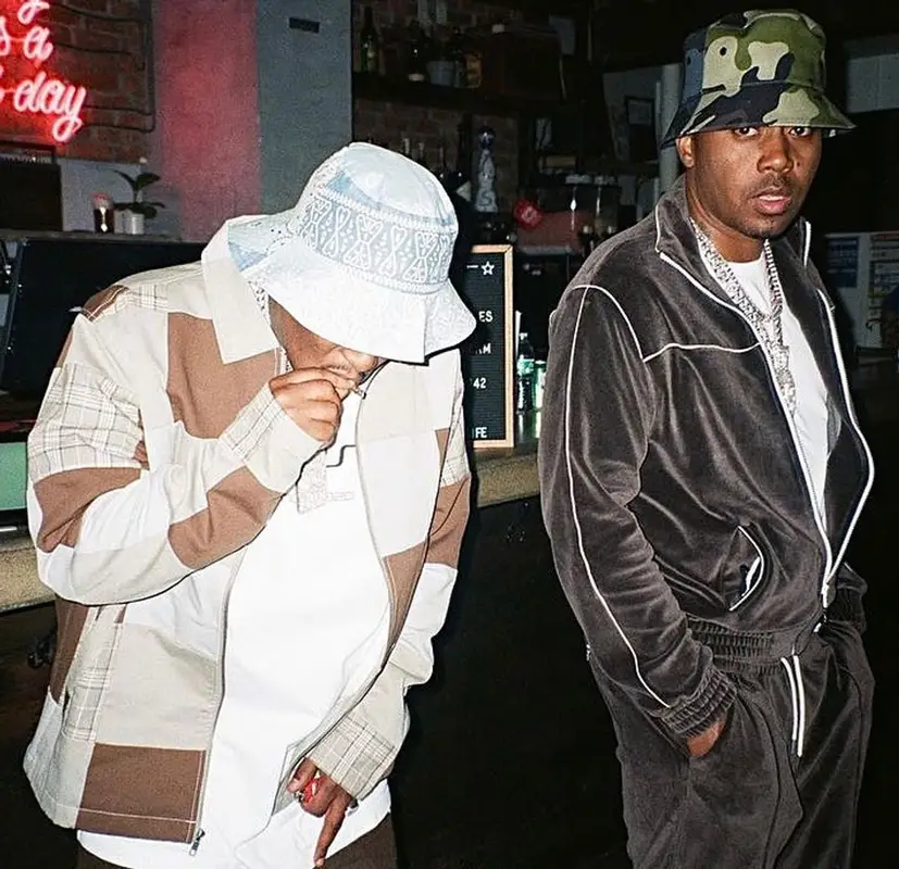Nas outfit in Celine and Burberry, 2021