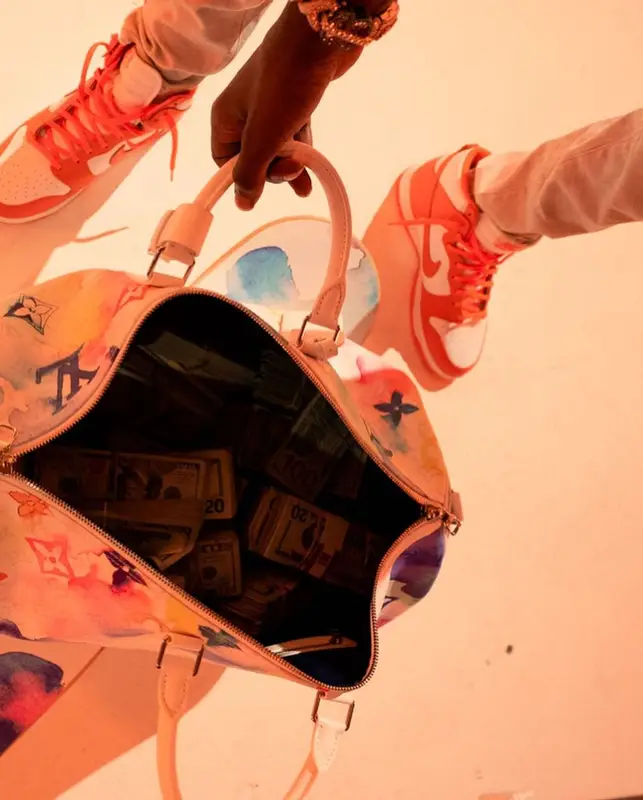 Young Dolph outfit in Louis Vuitton and Nike, 2021