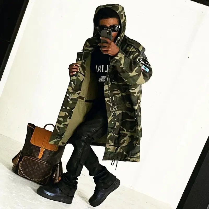 Lil HBK outfit in Nike, Louis Vuitton, and Versace, 2021
