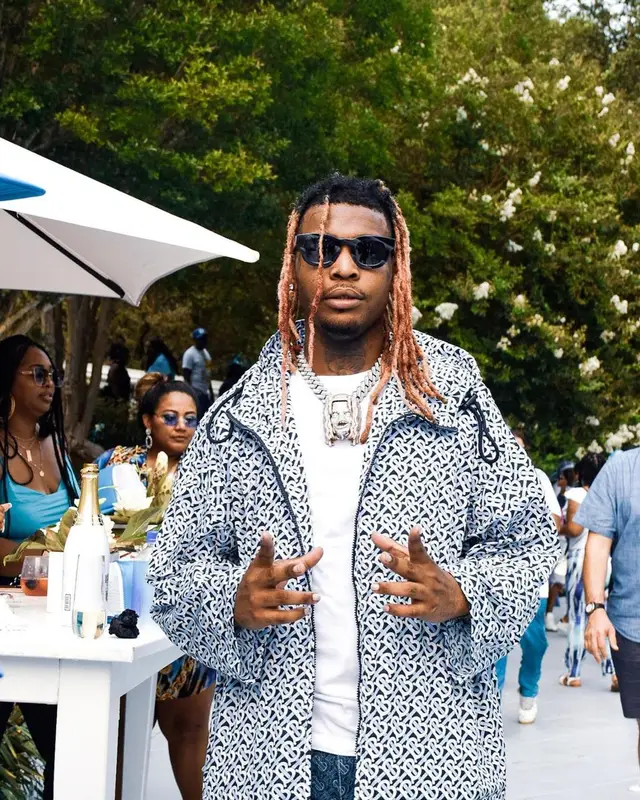 Lil Keed outfit in Burberry, Ralph Lauren, and Thierry Lasry, 2021