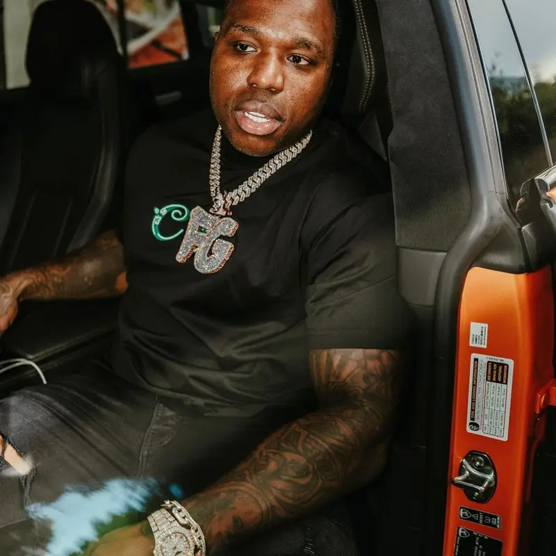 BandMan Kevo outfit in Dior, Amiri, and Kenny Scharf, 2021