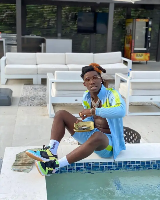 Hot Boii outfit in BooHooMan, Nike, and Cartier, 2021