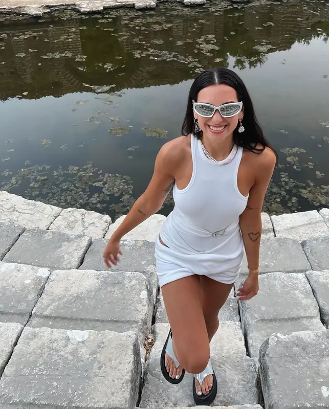 Dua Lipa outfit in Cartier, Balenciaga, and Prada, 2021