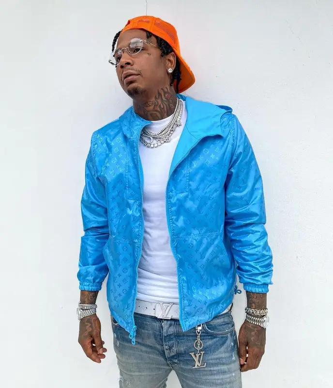 Moneybagg Yo outfit in Louis Vuitton, Amiri, and Cartier, 2021