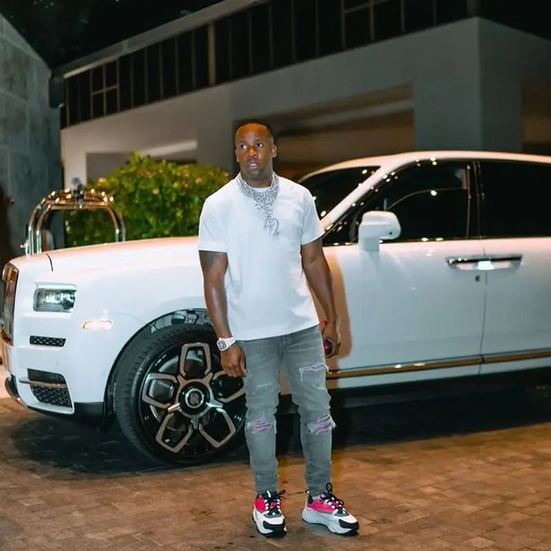 Yo Gotti outfit in Hanes, Amiri, and Dior, 2021