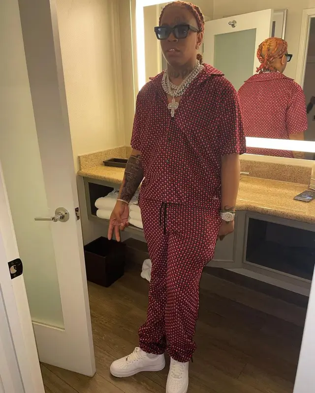 Lil Gotit outfit in Amiri, Nike, and Louis Vuitton, 2021