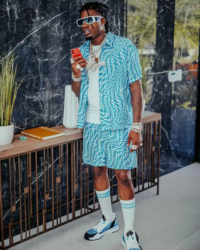 CJ So Cool outfit in Fendi, Louis Vuitton, and Amiri, 2021
