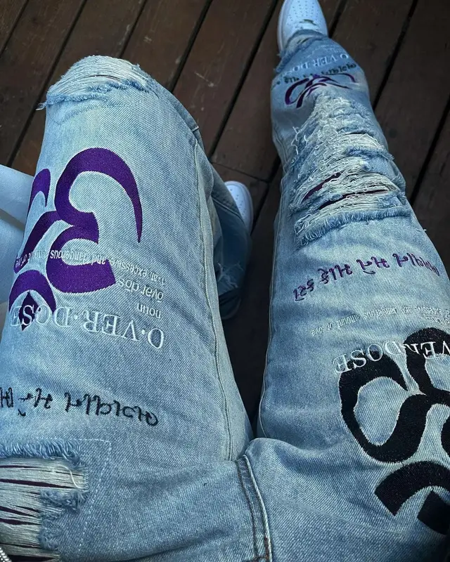 Lil Duke outfit in What Happened To God, Versace, and Supreme, 2021