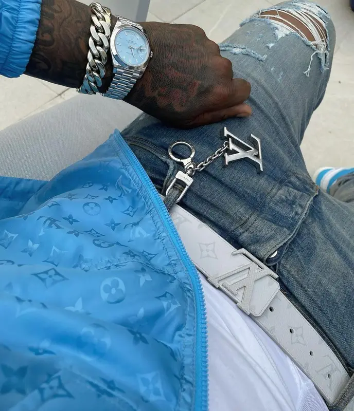Moneybagg Yo outfit in Louis Vuitton, Amiri, and Cartier, 2021