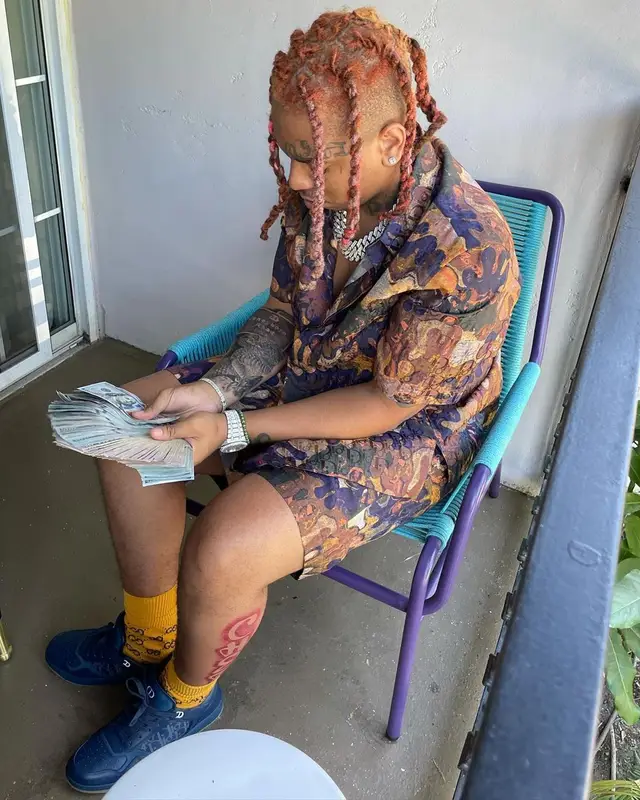 Lil Gotit outfit in Dior, Gucci, and Peter Doig, 2021