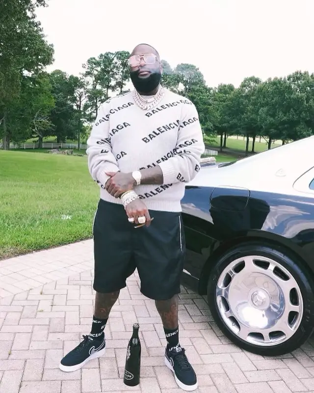 Rick Ross outfit in Balenciaga, Givenchy, and Louis Vuitton, 2021