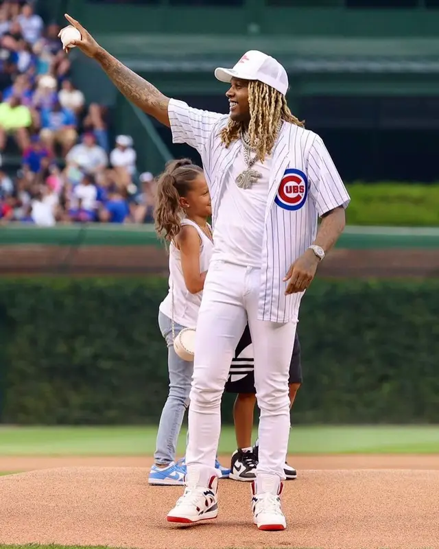 Lil Durk outfit in Nike, 4PF, and Rawlings, 2021