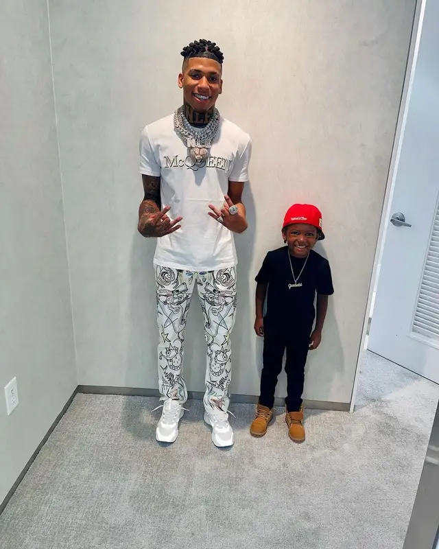 NLE Choppa outfit in Alexander McQueen, Burberry, and Dior, 2021