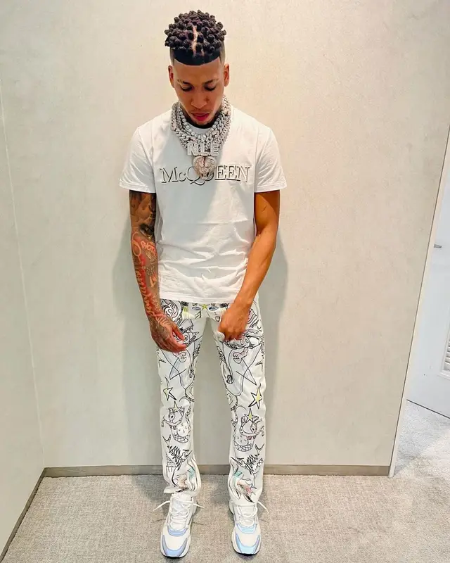 NLE Choppa outfit in Alexander McQueen, Burberry, and Dior, 2021