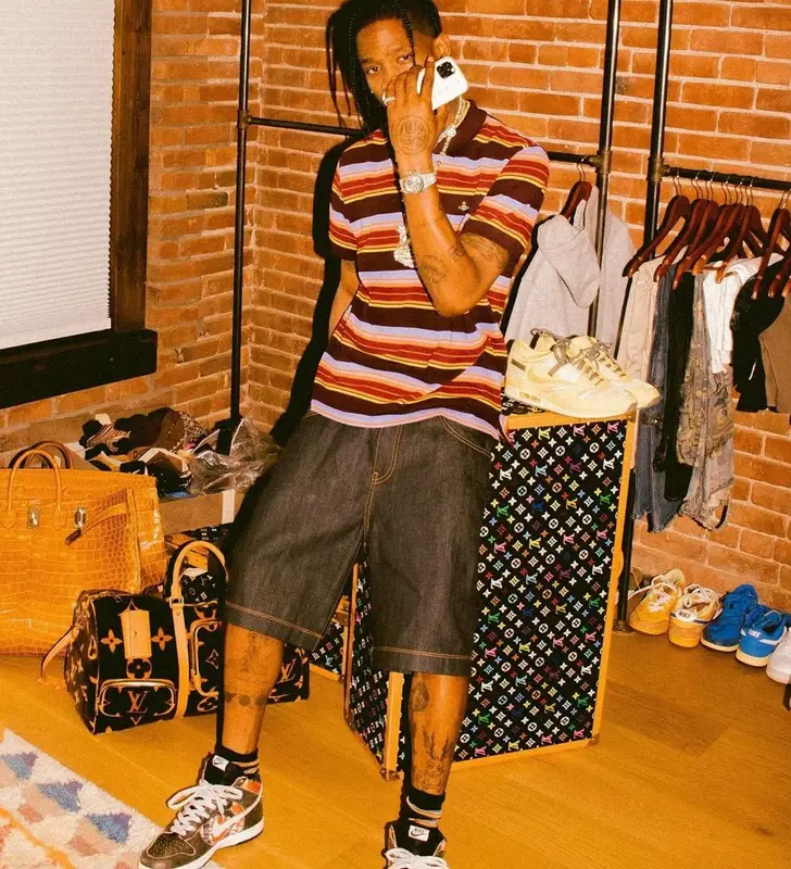 Travis Scott outfit in Vivienne Westwood, McDonald's Merch, and Cactus Jack, 2021