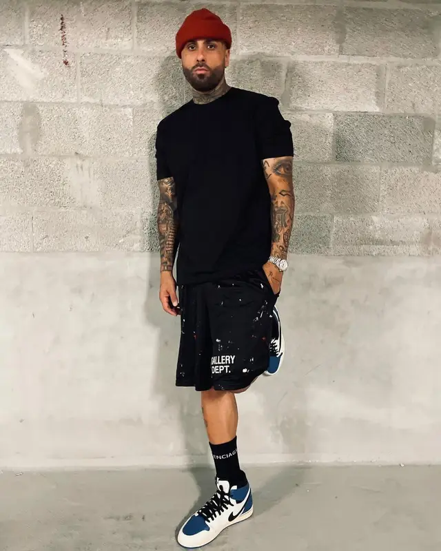 Nicky Jam outfit in Gallery Dept., Nike, and Balenciaga, 2021