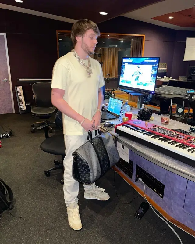 Murda Beatz outfit in Moncler, Givenchy, and Louis Vuitton, 2021