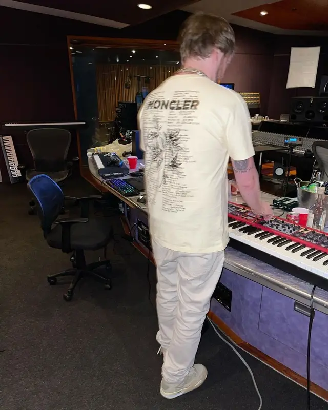 Murda Beatz outfit in Moncler, Givenchy, and Louis Vuitton, 2021