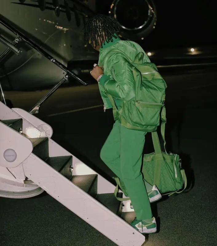 Lil Baby outfit in Bottega Veneta, Louis Vuitton, and Nike, 2021