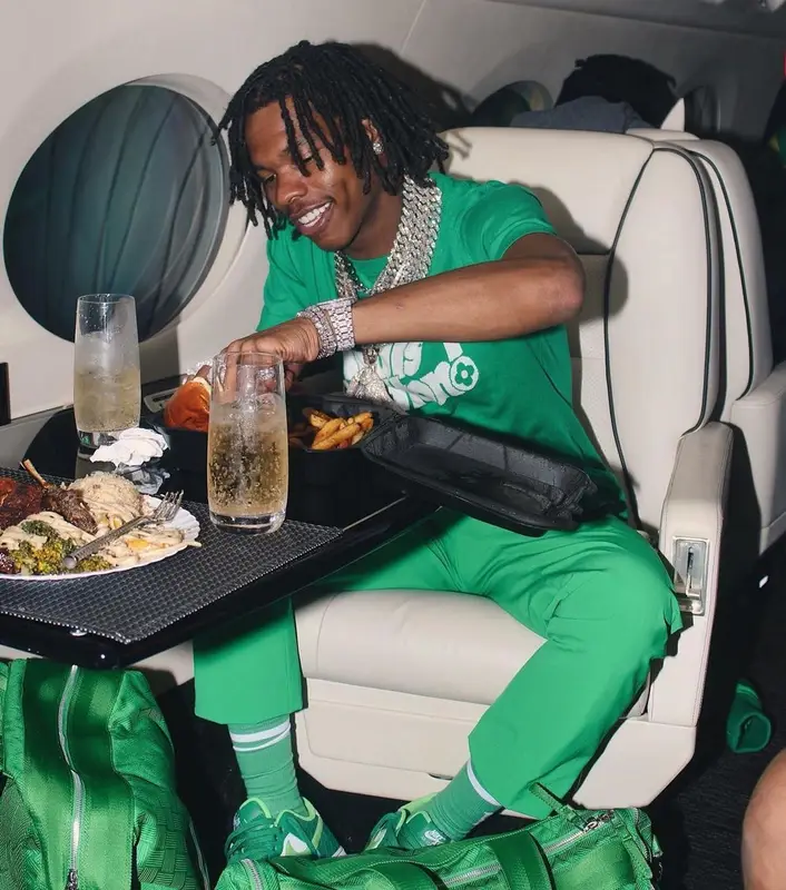Lil Baby outfit in Bottega Veneta, Louis Vuitton, and Nike, 2021