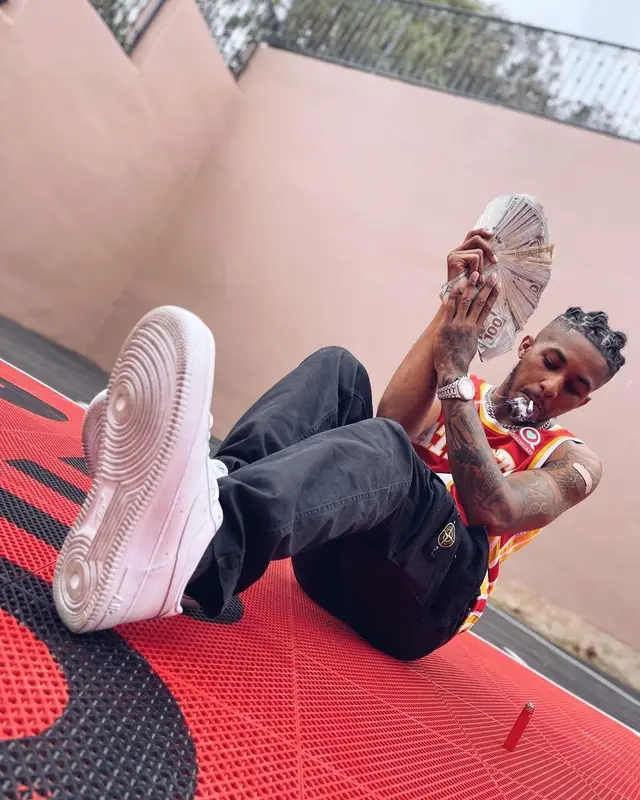 DDG outfit in Atlanta Hawks, Stone Island, and Nike, 2021