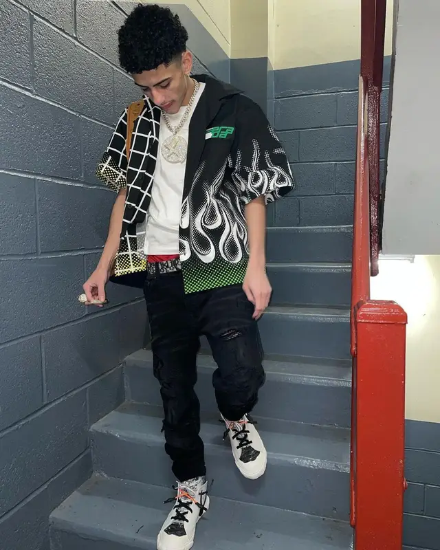 J.I. outfit in Prada, Amiri, and Nike, 2021