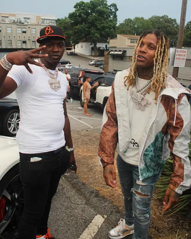 Lil Durk outfit in Louis Vuitton and Amiri, 2021