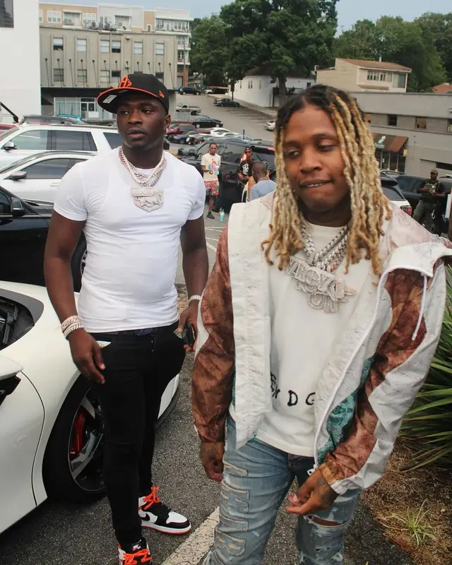 Lil Durk outfit in Louis Vuitton and Amiri, 2021
