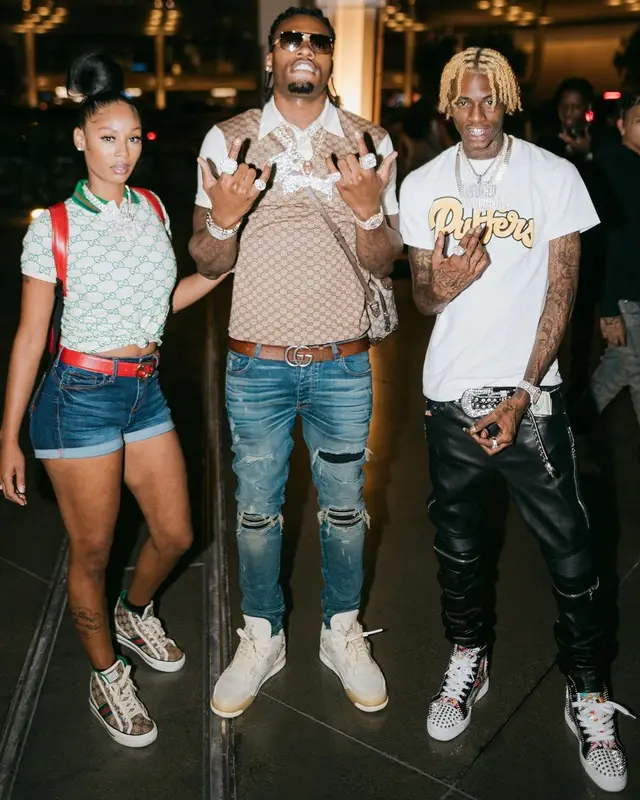 CJ So Cool outfit in Gucci, Amiri, and Louis Vuitton, 2021