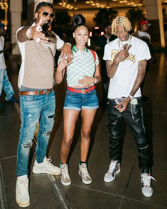CJ So Cool outfit in Gucci, Amiri, and Louis Vuitton, 2021