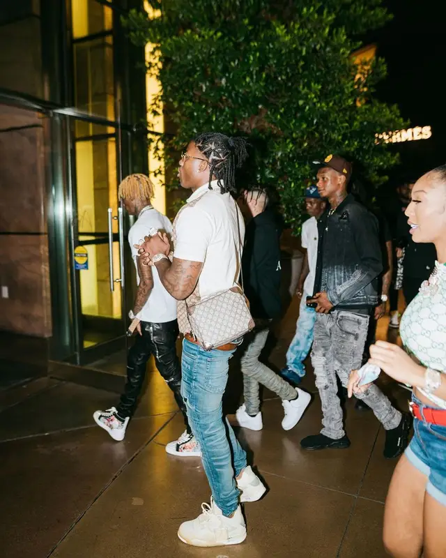 CJ So Cool outfit in Gucci, Amiri, and Louis Vuitton, 2021
