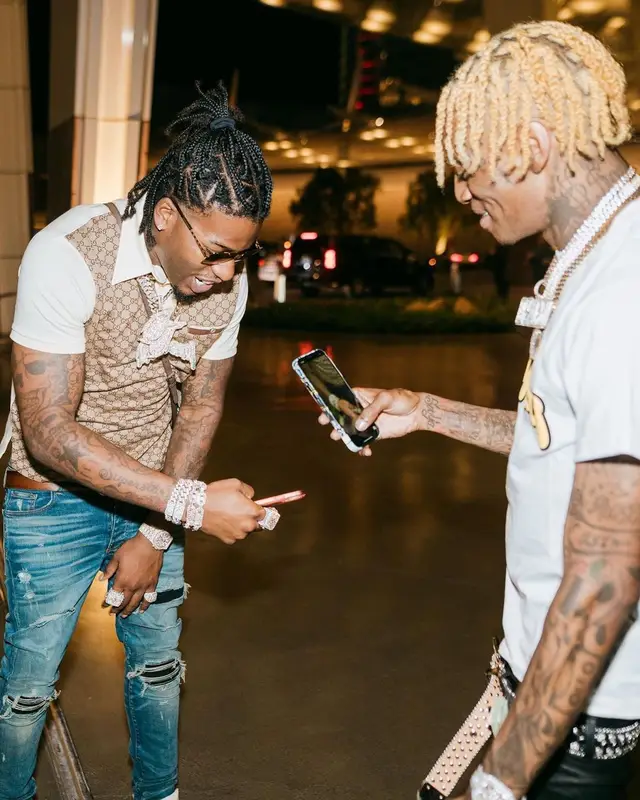 CJ So Cool outfit in Gucci, Amiri, and Louis Vuitton, 2021