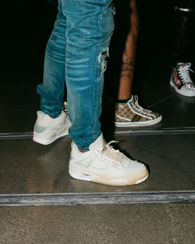 CJ So Cool outfit in Gucci, Amiri, and Louis Vuitton, 2021