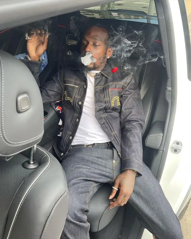 Sauce Walka outfit in Evisu and Jordan, 2021