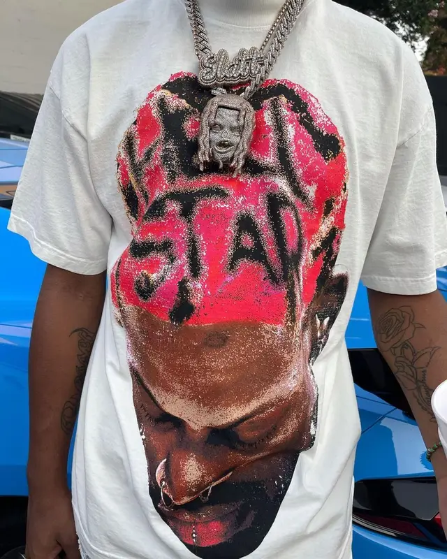 Lil Keed outfit in Purple Brand, Jordan, and Spider Worldwide, 2021