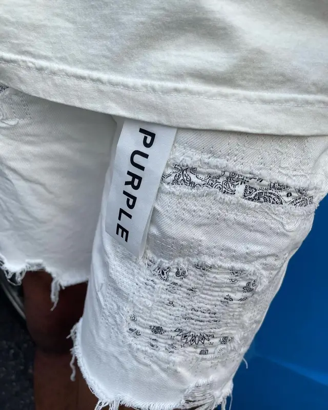 Lil Keed outfit in Purple Brand, Jordan, and Spider Worldwide, 2021