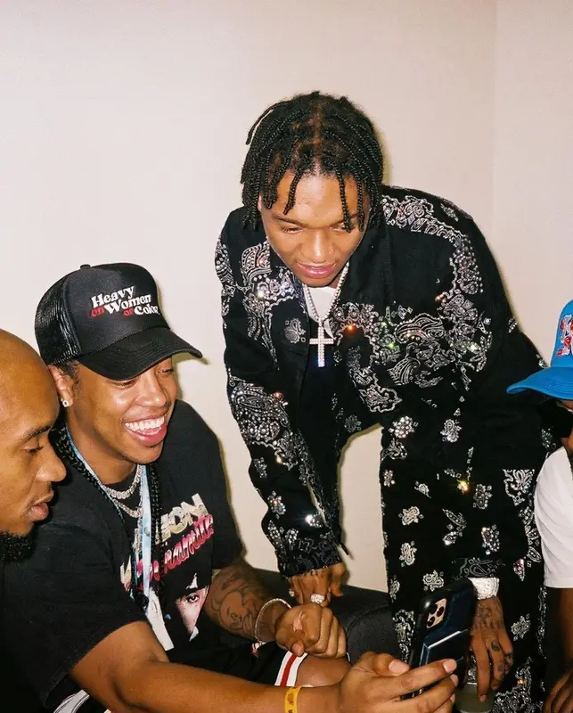 Swae Lee outfit in Amiri, Chanel, and Calvin Klein, 2021