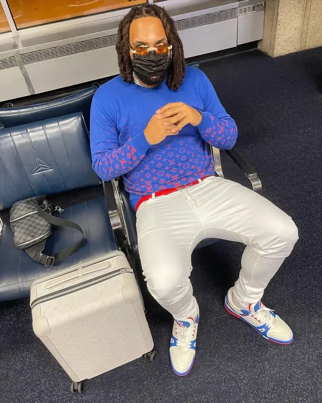 Money Man outfit in Louis Vuitton, Amiri, and Dior, 2021