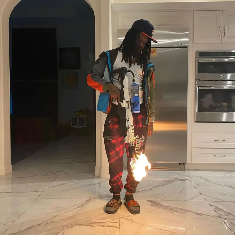 Chief Keef outfit in Von Dutch, New Era, and Gucci, 2020