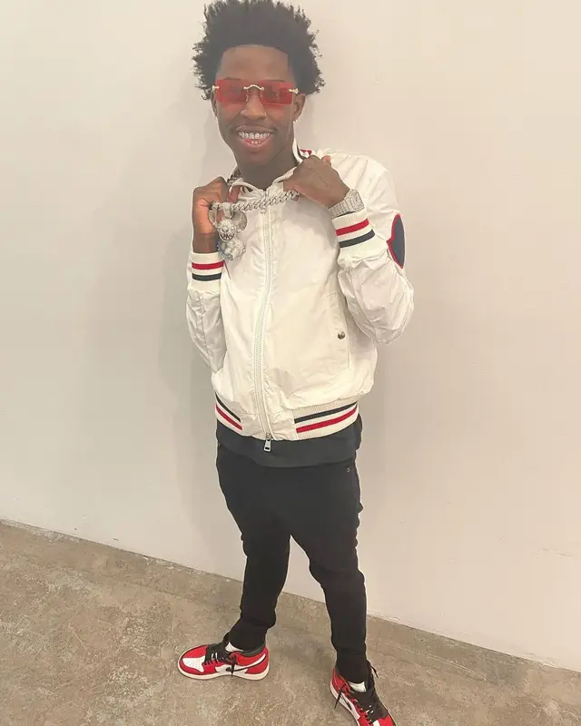 Quando Rondo outfit in Moncler, Amiri, and Nike, 2021