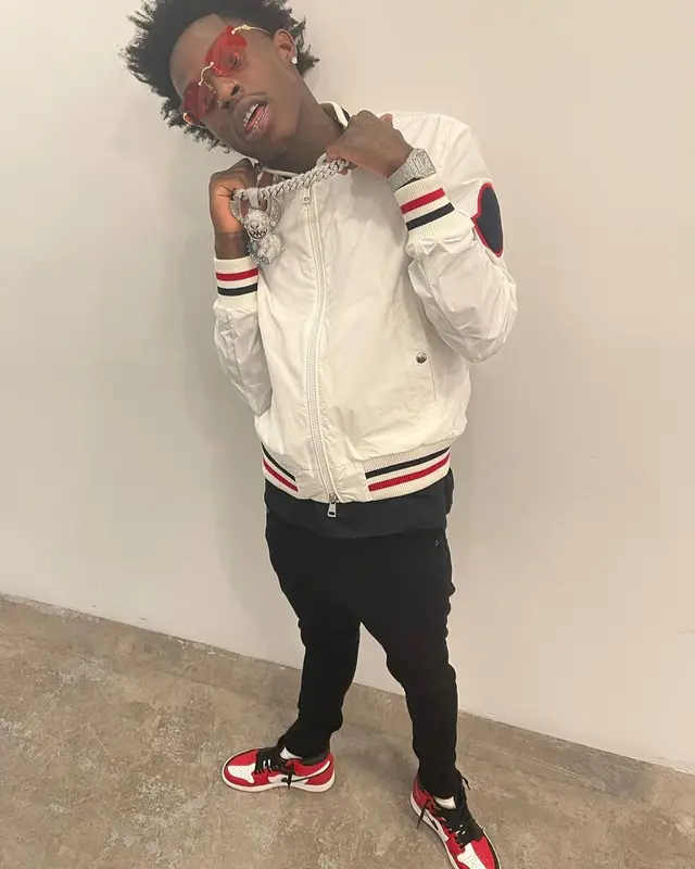 Quando Rondo outfit in Moncler, Amiri, and Nike, 2021