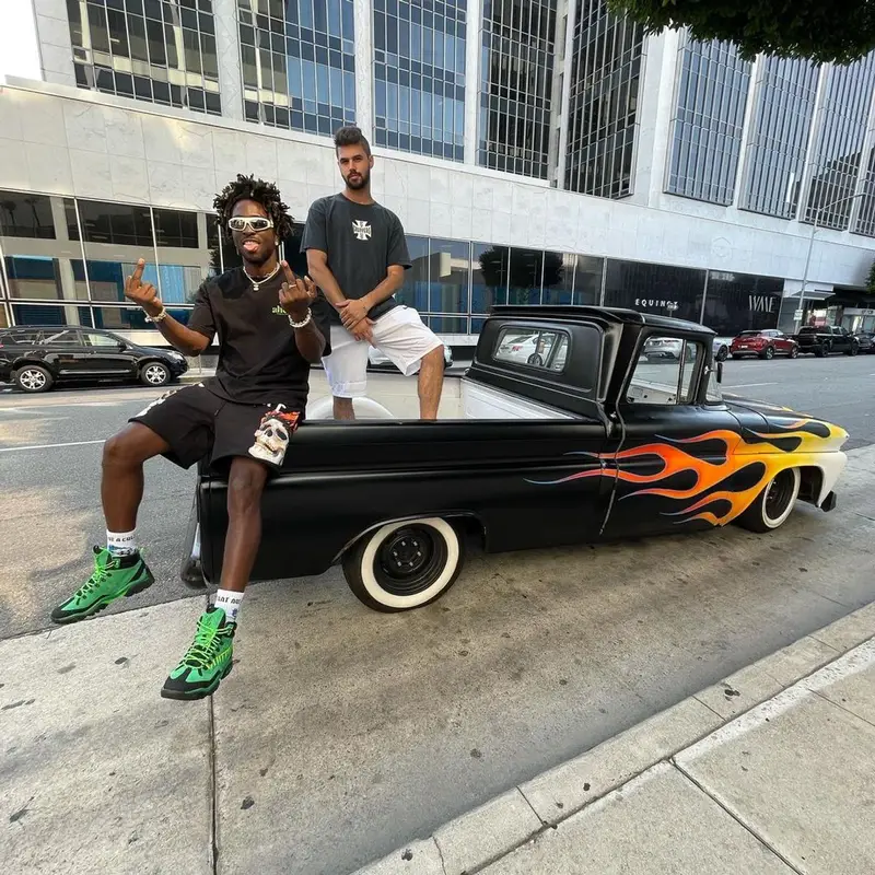 Saint JHN outfit in Christian Sex Club, Louis Vuitton, and Bottega Veneta, 2021