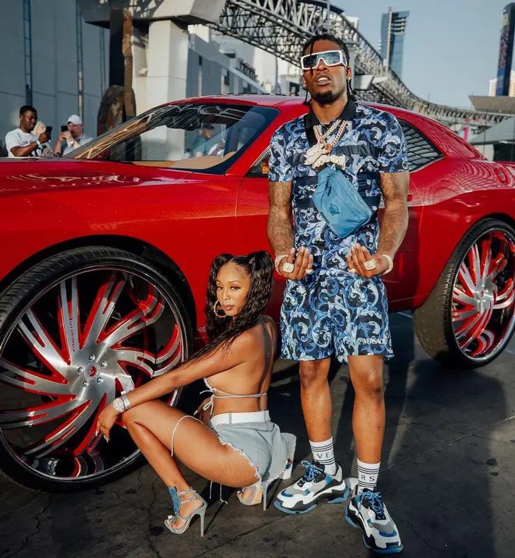 CJ So Cool outfit in Versace, Balenciaga, and Louis Vuitton, 2021