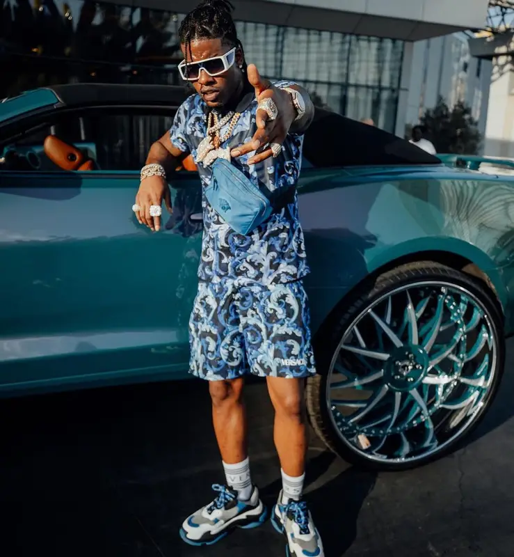 CJ So Cool outfit in Versace, Balenciaga, and Louis Vuitton, 2021