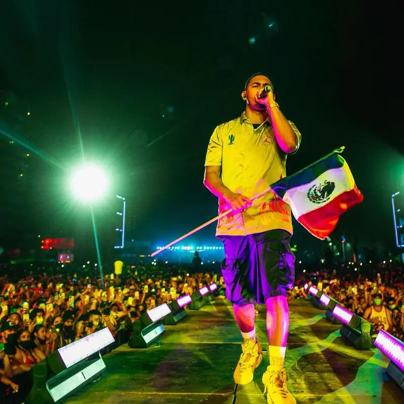 Myke Towers outfit in Jordan and Travis Scott Merch, 2021
